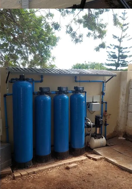 Array of blue water tanks for a multi-cylinder system.