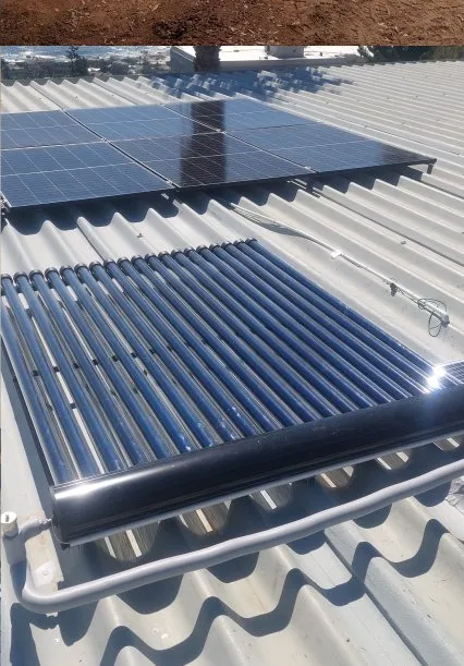 Solar hot water panel installation on a roof.